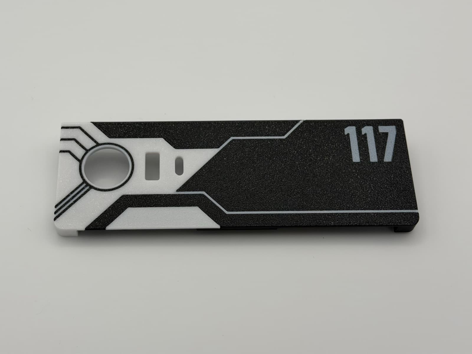 Two-color 3D printed device panel with printed graphics