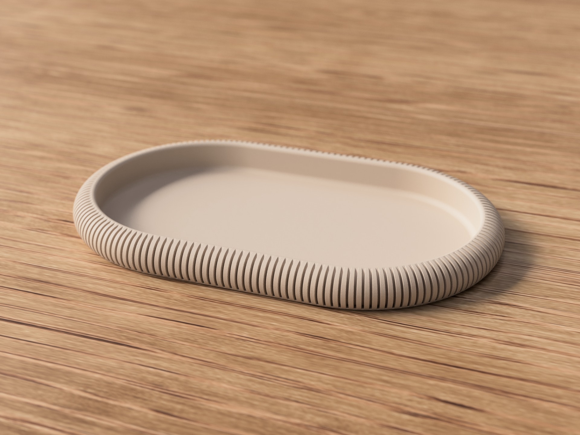 Oval decorative tray with a ribbed rim